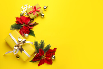Composition with flowers of Christmas plant poinsettia on color background