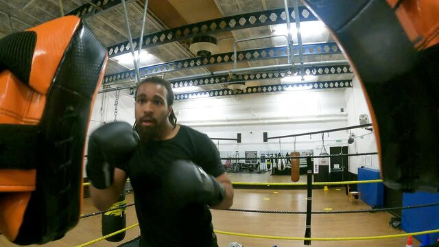 POV Of Male Boxer In The Ring Throwing Punches During A Workout