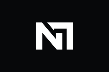 NM logo letter design on luxury background. MN logo monogram initials letter concept. NM icon logo design. MN elegant and Professional letter icon design on black background. M N NM MN