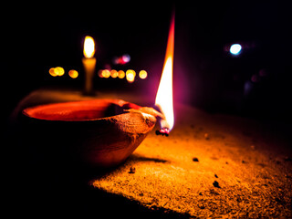 Burning candle in the night