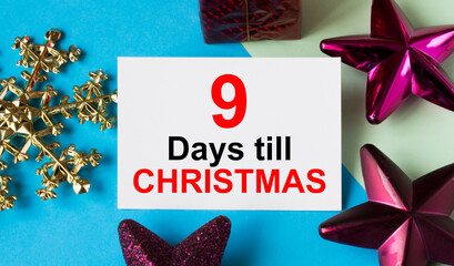 Christmas toys with greeting card with text 9 Days till Christmas