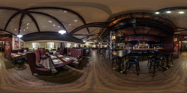 GRODNO, BELARUS - NOVEMBER, 2018: Full spherical seamless panorama 360 degrees in interior stylish chester vintage restaurant nightclub bar in equirectangular equidistant projection. VR content