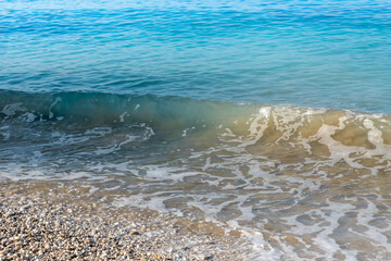 Sea waves on the pebble beach
