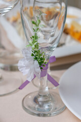 glass decorated with a sprig and flower