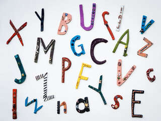 Letters of the alphabet on a white wall