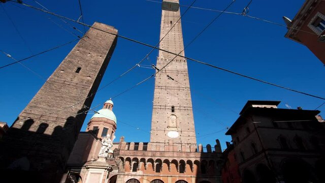 Hyper time lapse Bologna, Italy - Two Towers (Due Torri), Asinelli and Garisenda, symbols of medieval towers in the sumer 