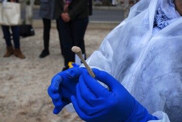 Holding a human bone for forensic study