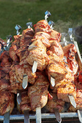 Fried meat on skewers. Grill over coals.