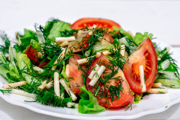 fresh salad of vegetables and cheese chechil close-up