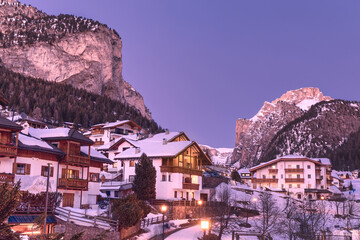 Fototapeta na wymiar Winter ski resort Selva di Val Gardena in Italian Alps at dusk