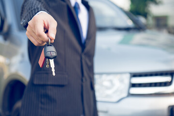 Car Keys,hand showing keys of automobile,Businessman 