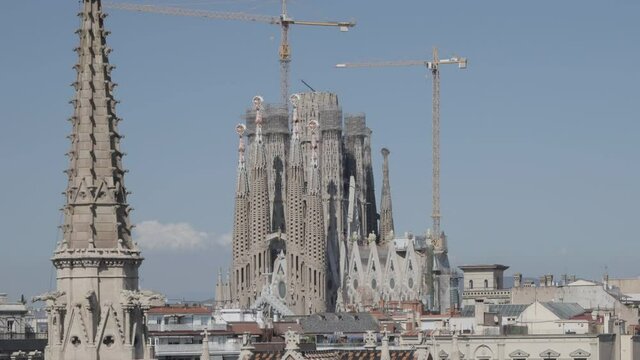 panoramic view of barcelona sagrada familia time lapse a sunny day