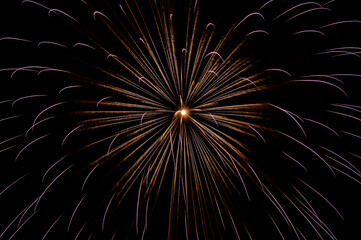 Beautiful sparkling holiday fireworks in the night sky