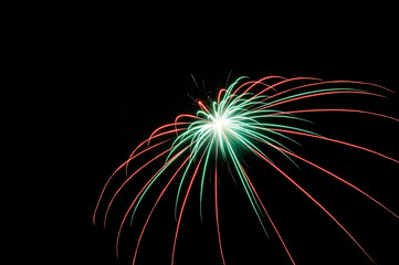 Beautiful sparkling holiday fireworks in the night sky