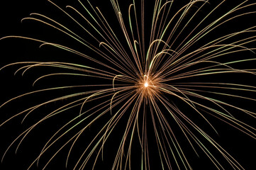 Beautiful sparkling holiday fireworks in the night sky