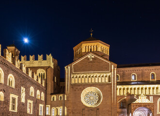 Christmas in Trento with the Christmas lights and decoration. Cathedral of San Vigilio in main square of old town. Trento, Trentino Alto Adige, northern Italy. Christmas 2020..