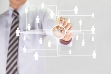 Businessman interacting with futuristic interface,virtual screen dart board