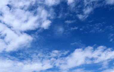 Fototapeta premium Blue sky background with clouds, White clouds floating on blue sky for backgrounds concept