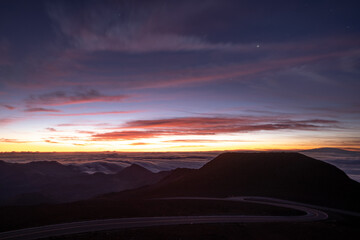 Fototapeta na wymiar a sunset over a mountain