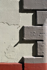 Close Up of Stone Quoins on Corner of Painted Building 