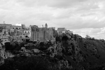 a stone building on a hill