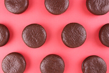 Chocolate chip cookies on pink background