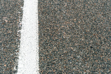 Empty asphalt road. New fresh asphalt pavement away from the city. Development of rural...