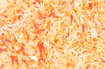 
Close up view of biryani rice or popularly called as Nasi Arab on the white plate over white background. Delicious food.