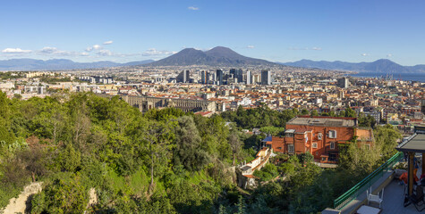 Naples, Italy - a Unesco World Heritage old town, Naples displays also a modern business center, here dominated by Mount Vesuvius on the background 