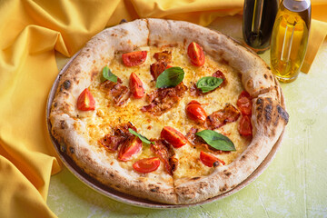Delicious Italian Pizza Carbonara with Bacon, eggs and mozzarella cheese.
