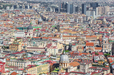 Naples, Italy - a Unesco World Heritage old town, Naples displays also a modern business center, here dominated by Mount Vesuvius on the background 