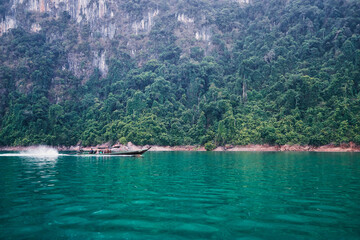 Beautiful landscape with lake and natural attractions on Cheow Lan Lake at Khao Sok National Park, Surat Thani Province, Thailand.
