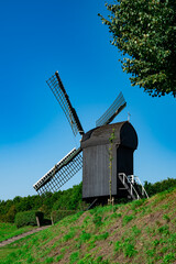 Fototapeta na wymiar Black wooden mill in Bourtange, The Netherlands