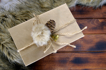 
Gift on wooden background. gift box with tag on wooden background. Gift box with ribbon on wood background with space / Vintage concept