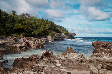 Rock shore, sea natural pool lagoon. Siargao Island.