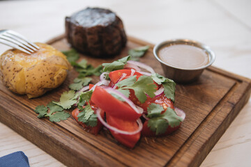 meat with potatoes tomatoes