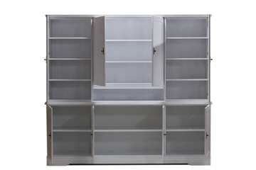 Retro style modern white kitchen cabinet with open doors and shelves. Open doors of a white wooden kitchen cabinet with shelves isolated on a white background.