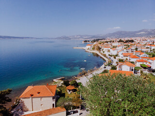Aerial shot of the Kastel coast in Dalmatia,Croatia . A famous tourist destination. Old town near on the Adriatic sea.