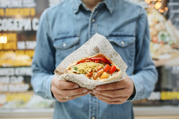 person holding pitta