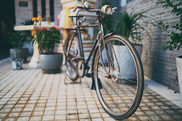 Fototapeta na wymiar Vintage bicycle parked on the street.
