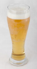Light wheat beer in a glass glass