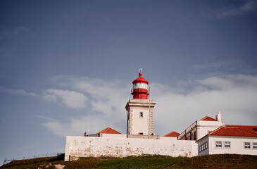 Fototapeta na wymiar Famous lighthouse on Cabo da Roca, the western point of Europe.