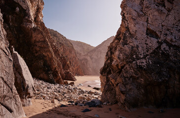 Fototapeta na wymiar Cliffs and rocks on the ocean coast.