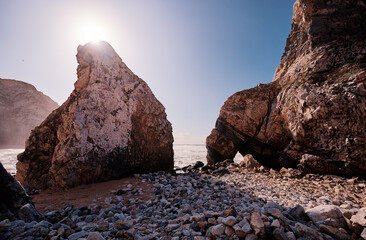 Fototapeta na wymiar Cliffs and rocks on the ocean coast.