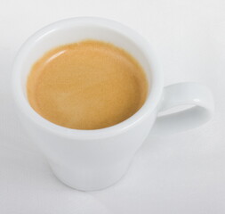 Espresso coffee in a white Cup