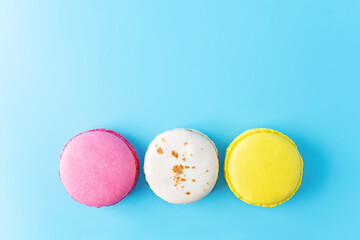 Multicolor macarons with chocolate berry cream cheese filling