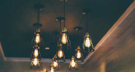 Light, design and interior. Vintage metallic lanterns.