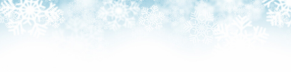 Naklejka premium Falling Snowflakes Vector Christmas Decoration Abstract Blurred Background. Merry Christmas And Happy New Year Banner Design Template. Winter Season Snowfall Illustration Wide Wallpaper