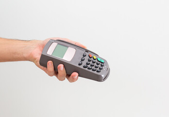 Payment on a trade through contactless card and NFC technology. Front view. Horizontal composition.