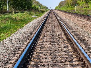 Fototapeta na wymiar The railway goes into the distance